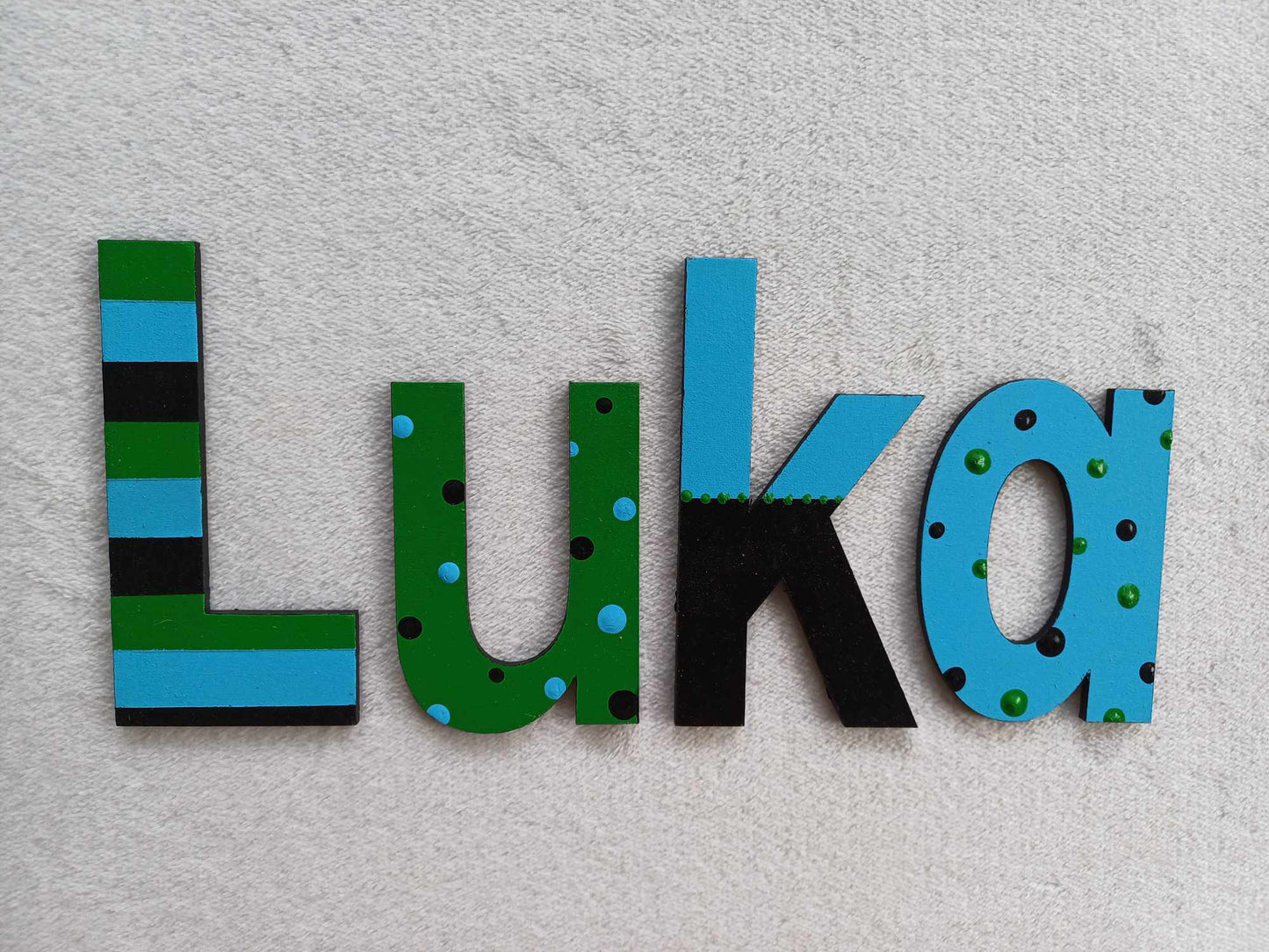 Luka - small letters suitable for a door.