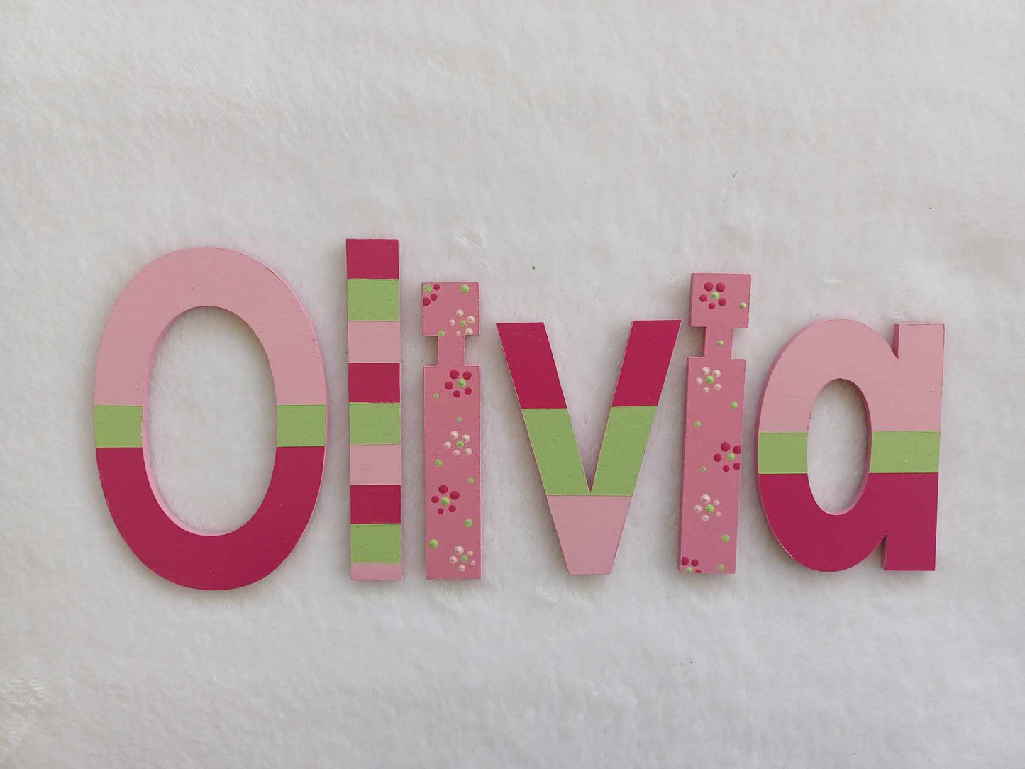 Olivia - small letters suitable for a door.