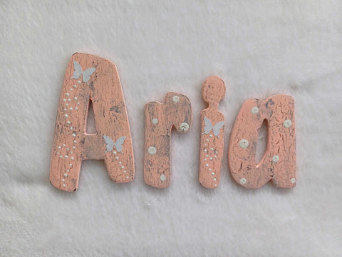 Aria - small letters suitable for a door.