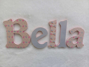 Bella - small letters suitable for a door.