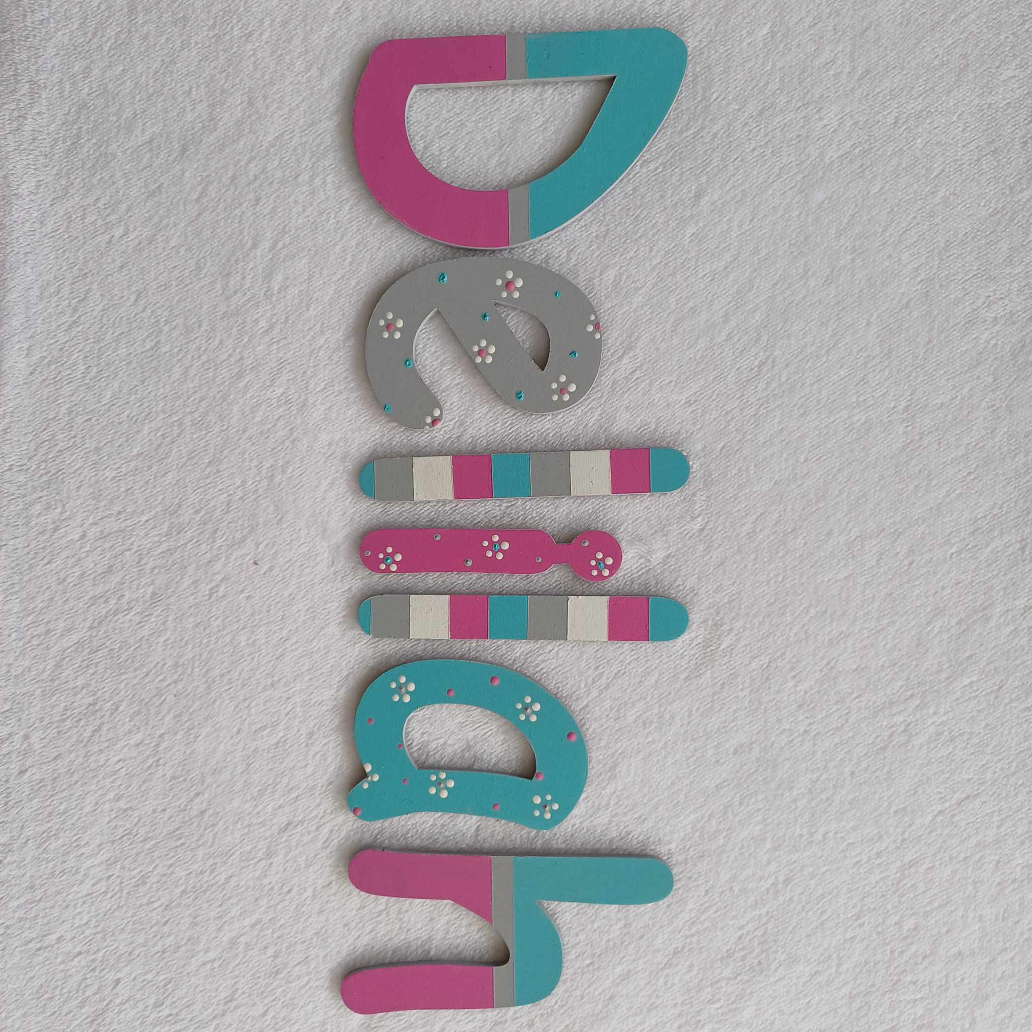 Delilah - small letters suitable for a door.