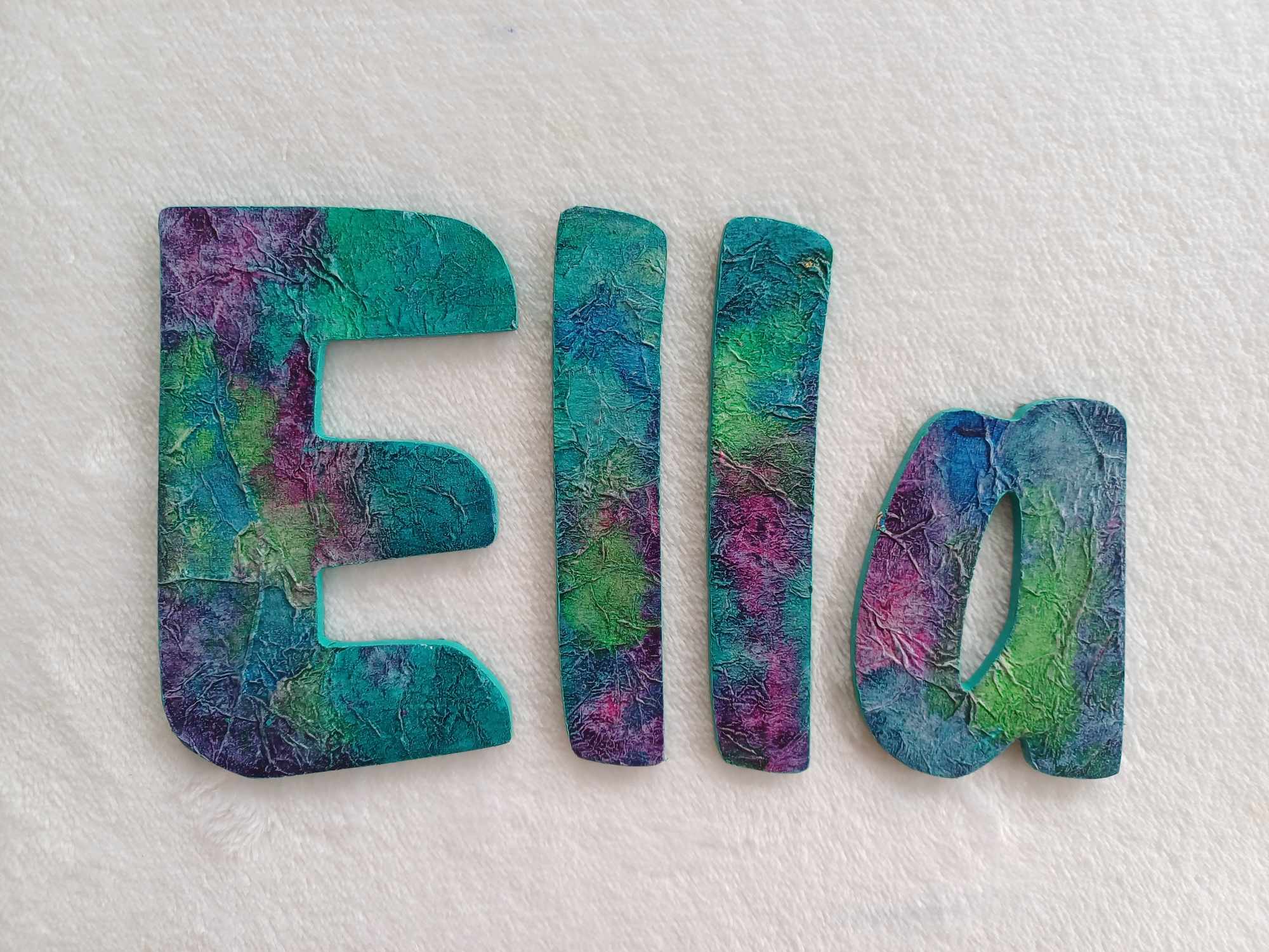 Ella - small letters suitable for a door.