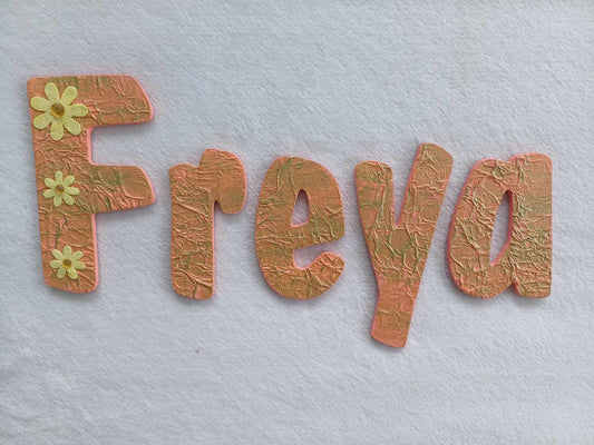 Freya small letters suitable for a door.
