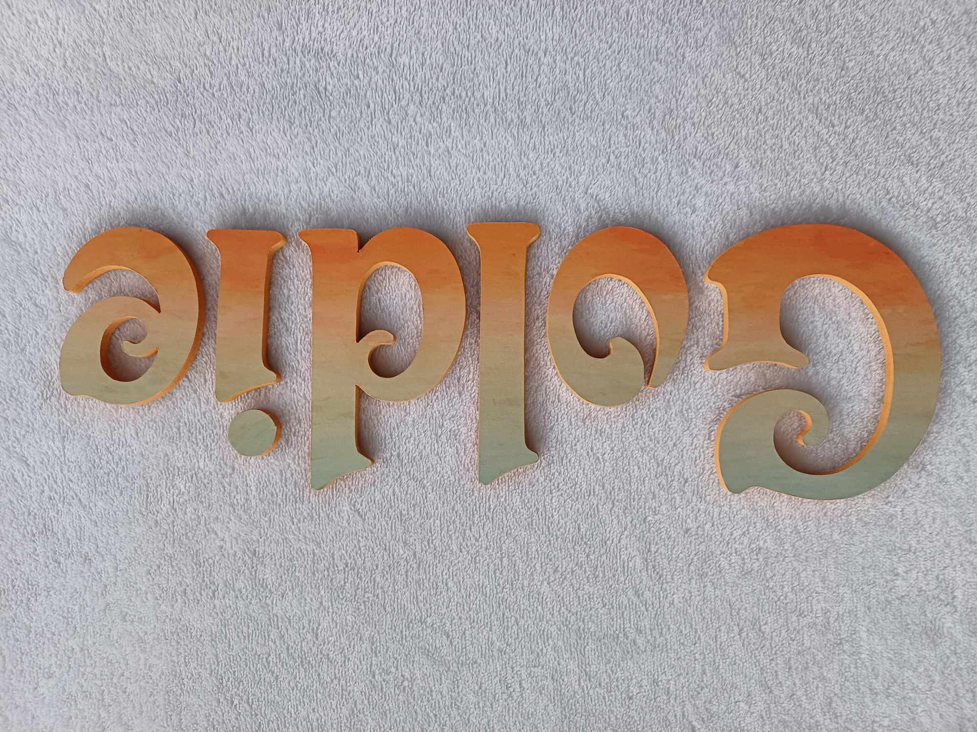 Goldie - small letters suitable for a door.