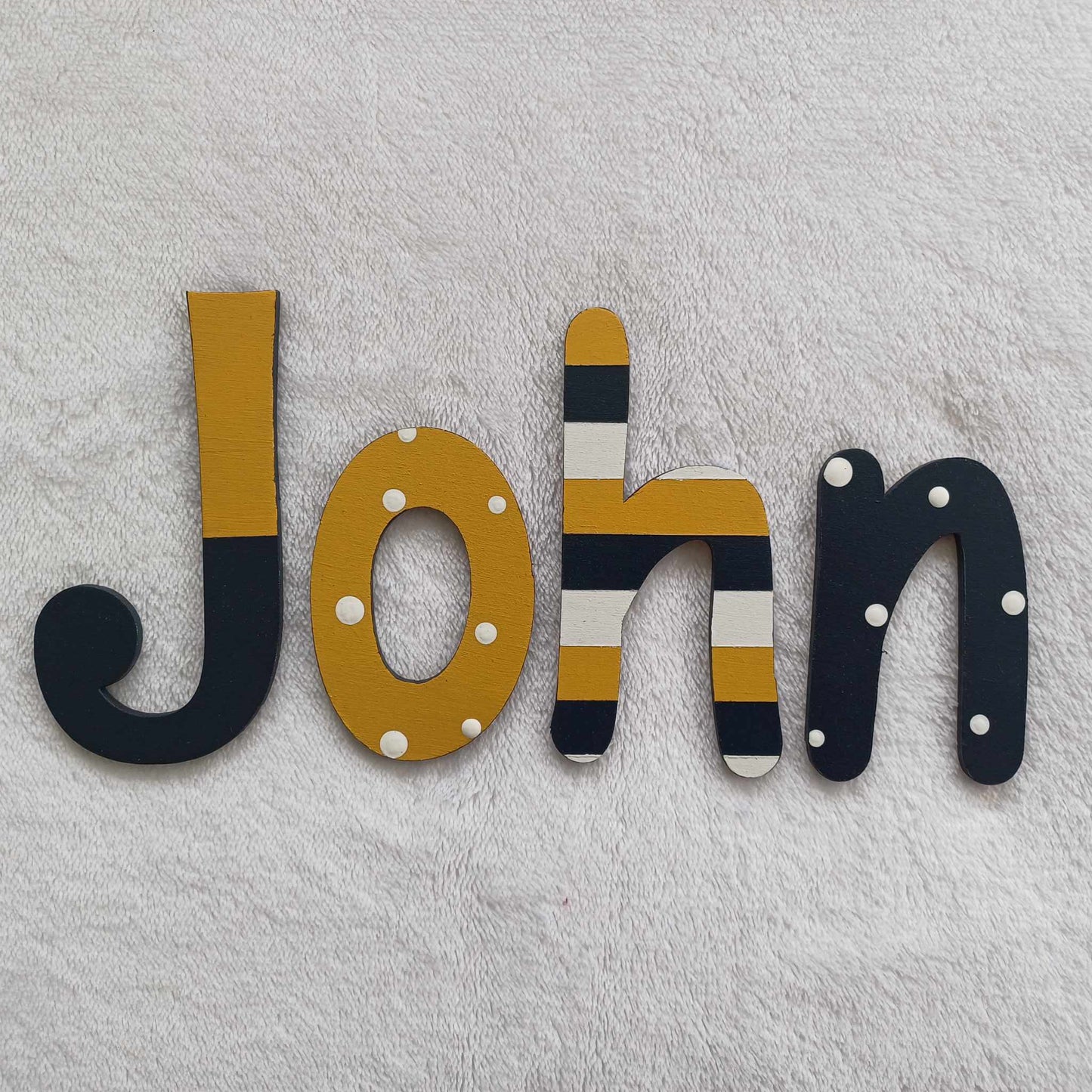 John - small letters suitable for a door.