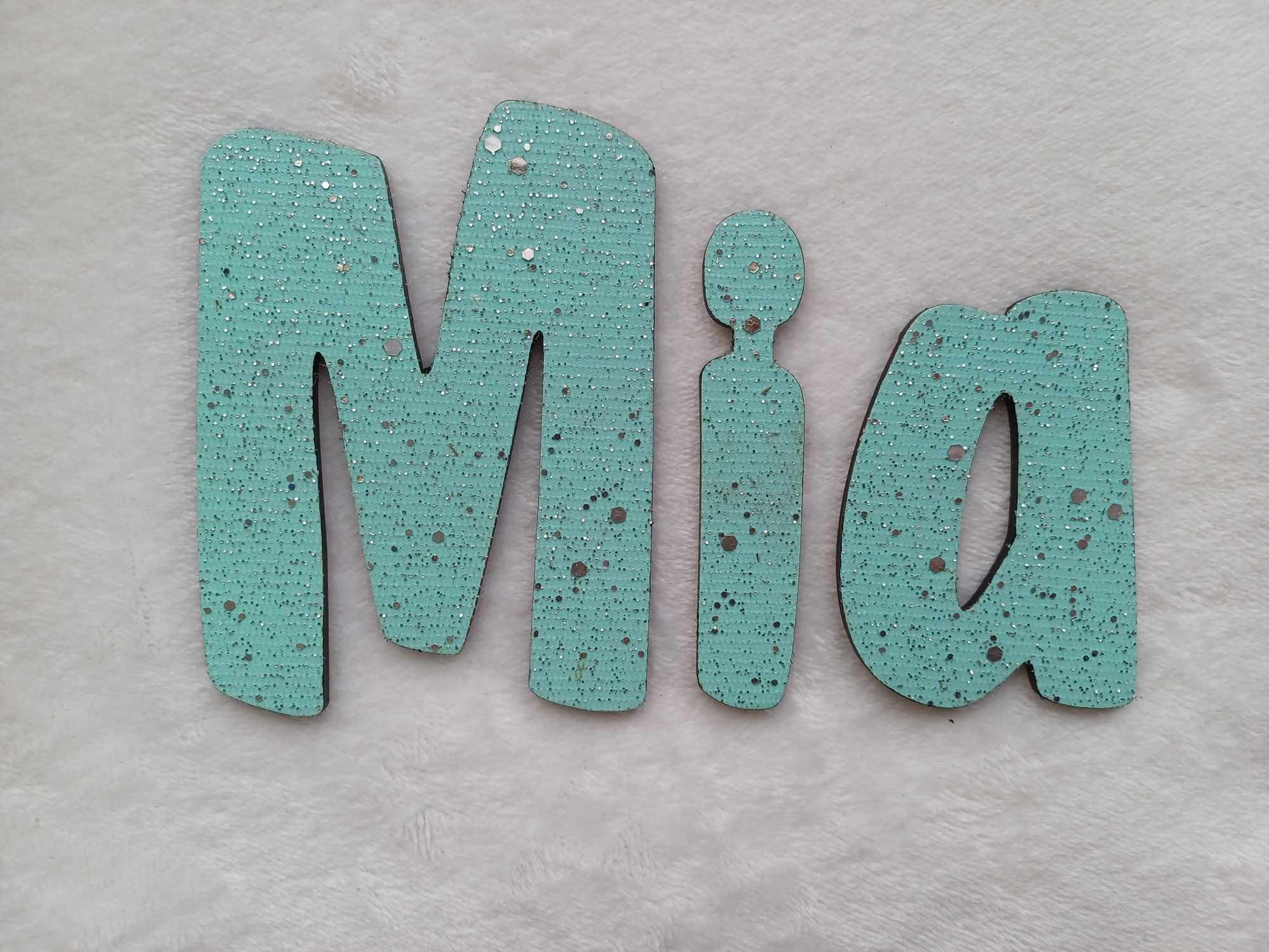 Mia - small letters suitable for a door.