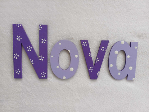 Nova - small letters suitable for a door.