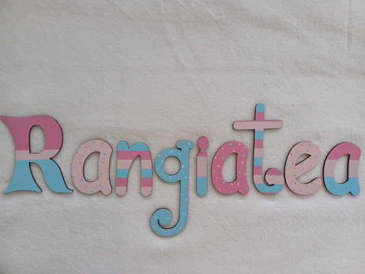 Rangiatea - small letters suitable for a door.