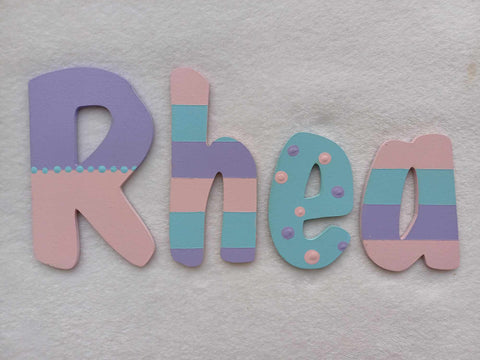 Rhea - small letters suitable for a door.