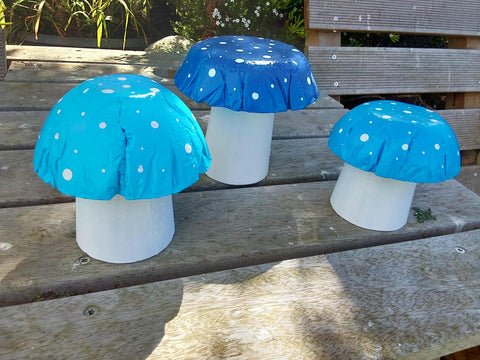 Set of 3 mixed blues concrete mushrooms.