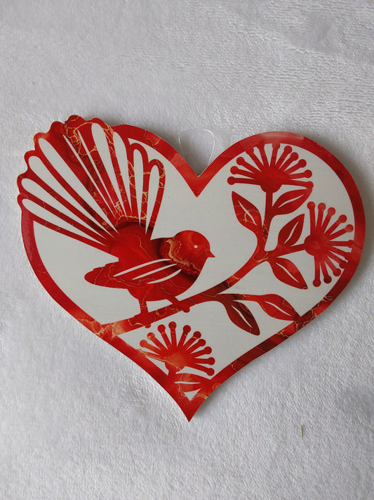 Fantail, piwaiwaka heart.