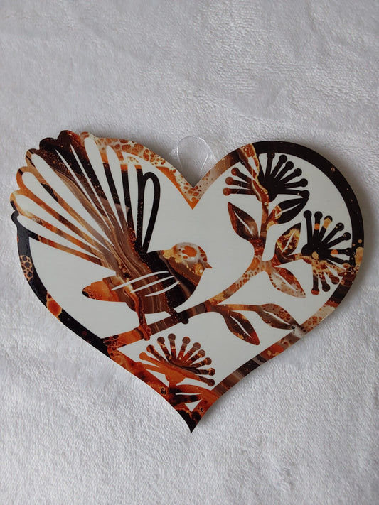 Fantail, piwaiwaka heart.